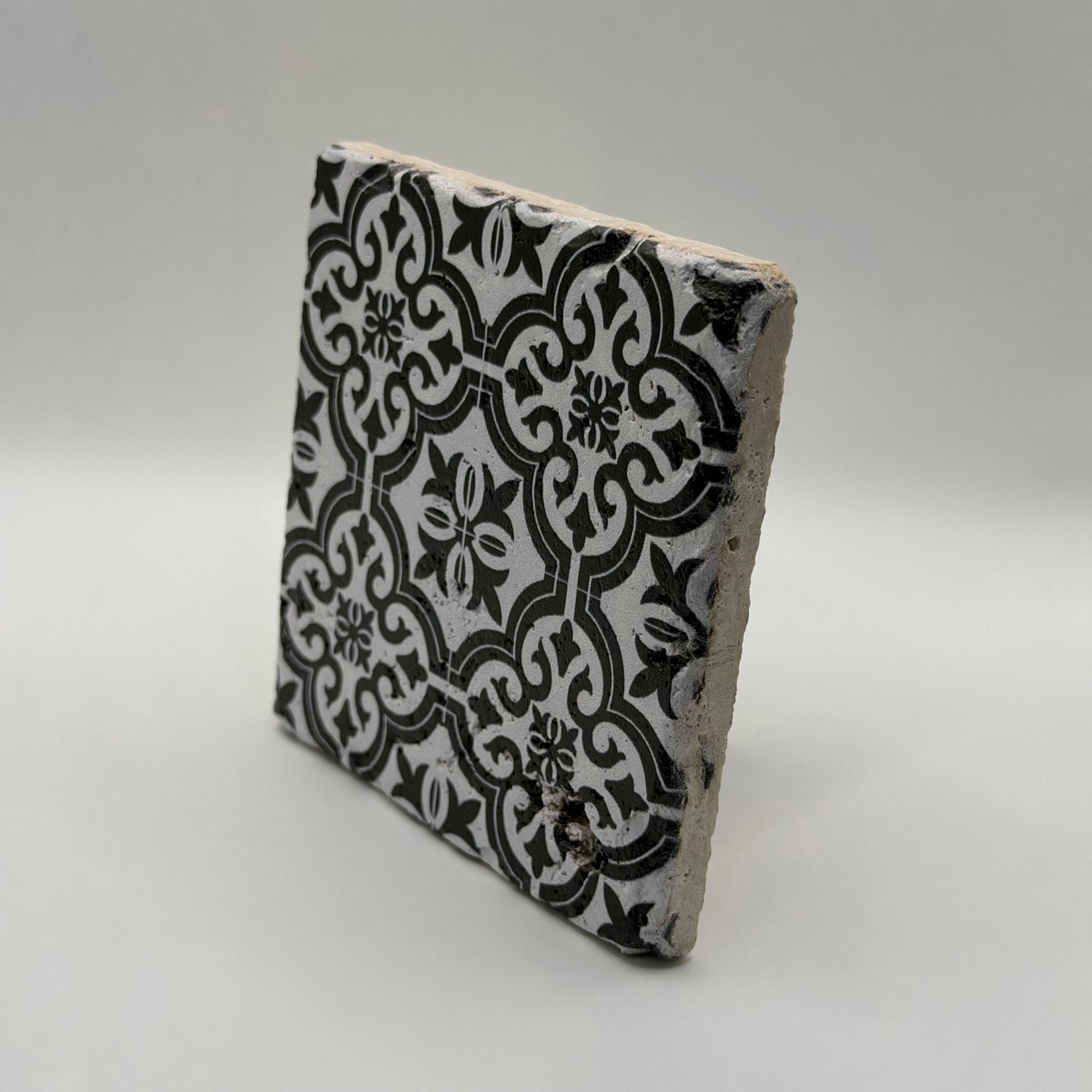 Ethnics pattern number 32 printed on a natural travertine stone coaster