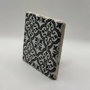 Ethnics pattern number 32 printed on a natural travertine stone coaster