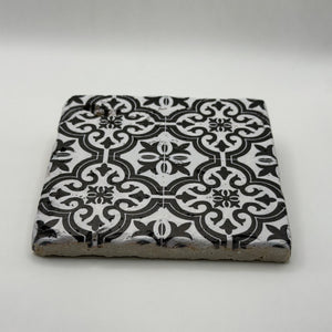 Ethnics pattern number 32 printed on a natural travertine stone coaster