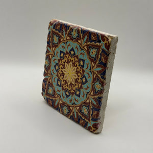 Ethnics pattern number 35 printed on a natural travertine stone coaster