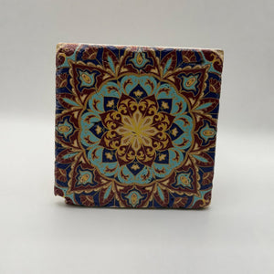 Ethnics pattern number 35 printed on a natural travertine stone coaster
