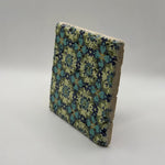 Ethnics pattern number 36 printed on a natural travertine stone coaster