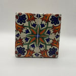 Ethnics pattern number 37 printed on a natural travertine stone coaster