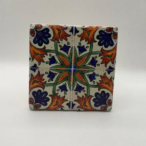 Ethnics pattern number 37 printed on a natural travertine stone coaster