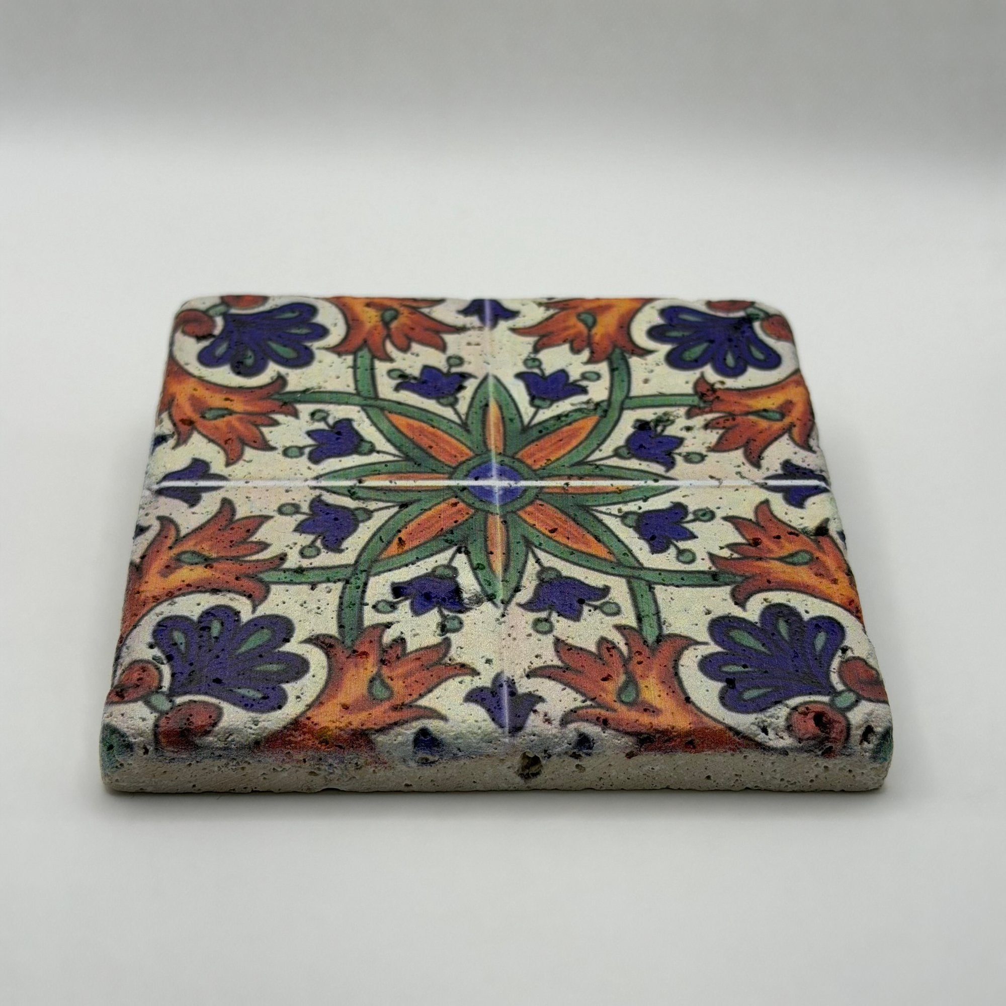 Ethnics pattern number 37 printed on a natural travertine stone coaster