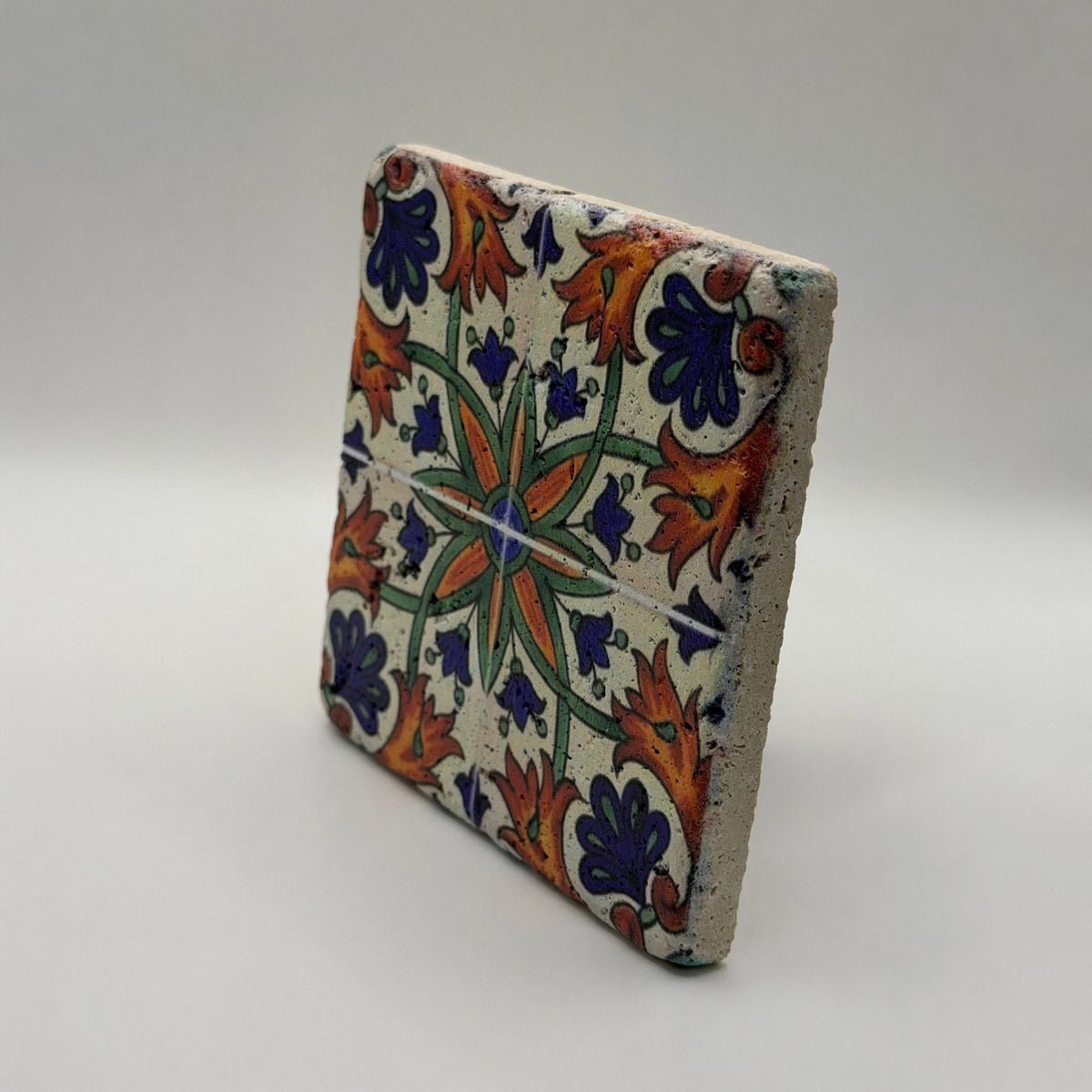 Ethnics pattern number 37 printed on a natural travertine stone coaster