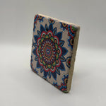 Ethnics pattern number 38 printed on a natural travertine stone coaster