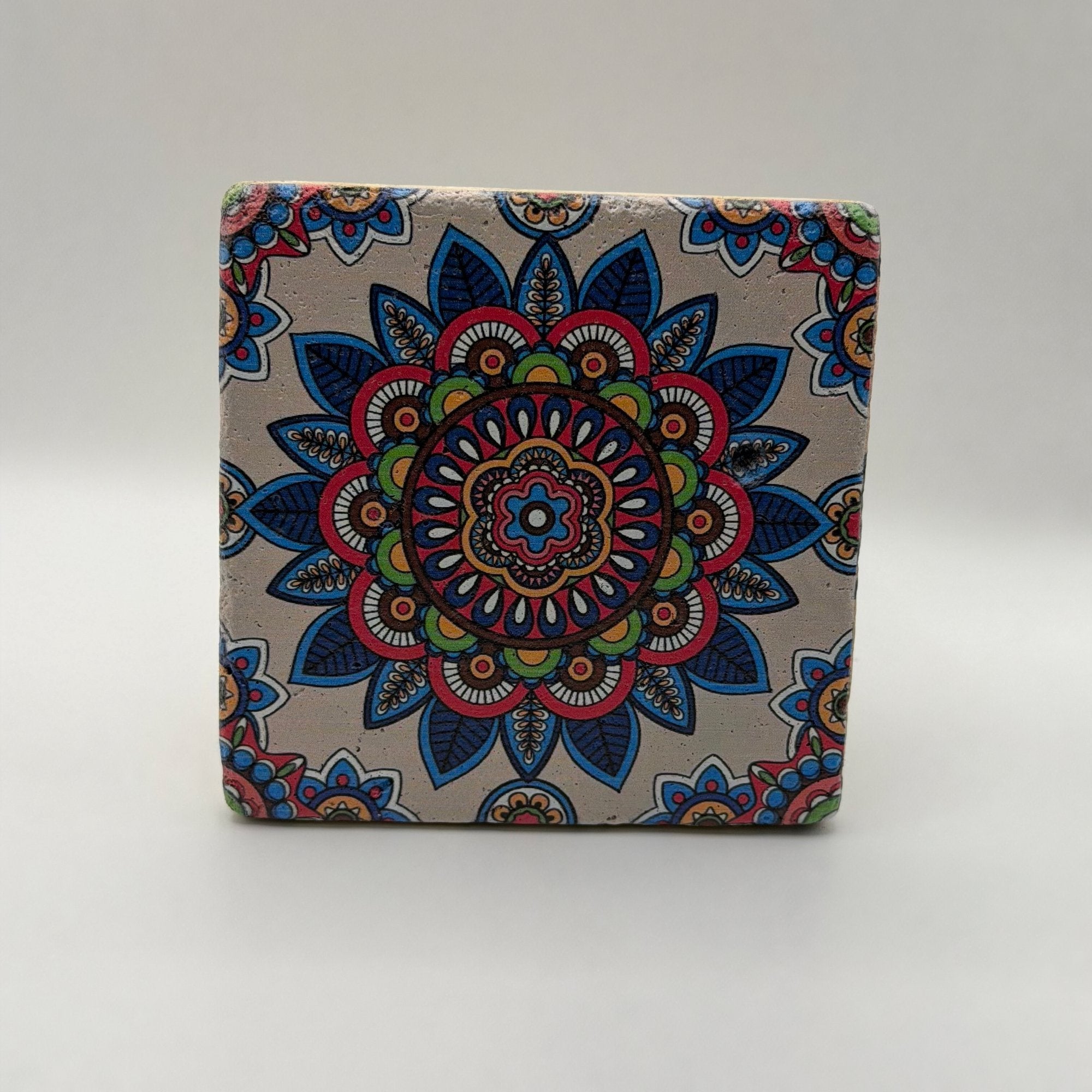 Ethnics pattern number 38 printed on a natural travertine stone coaster