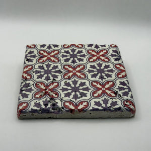 Ethnics pattern number 39 printed on a natural travertine stone coaster