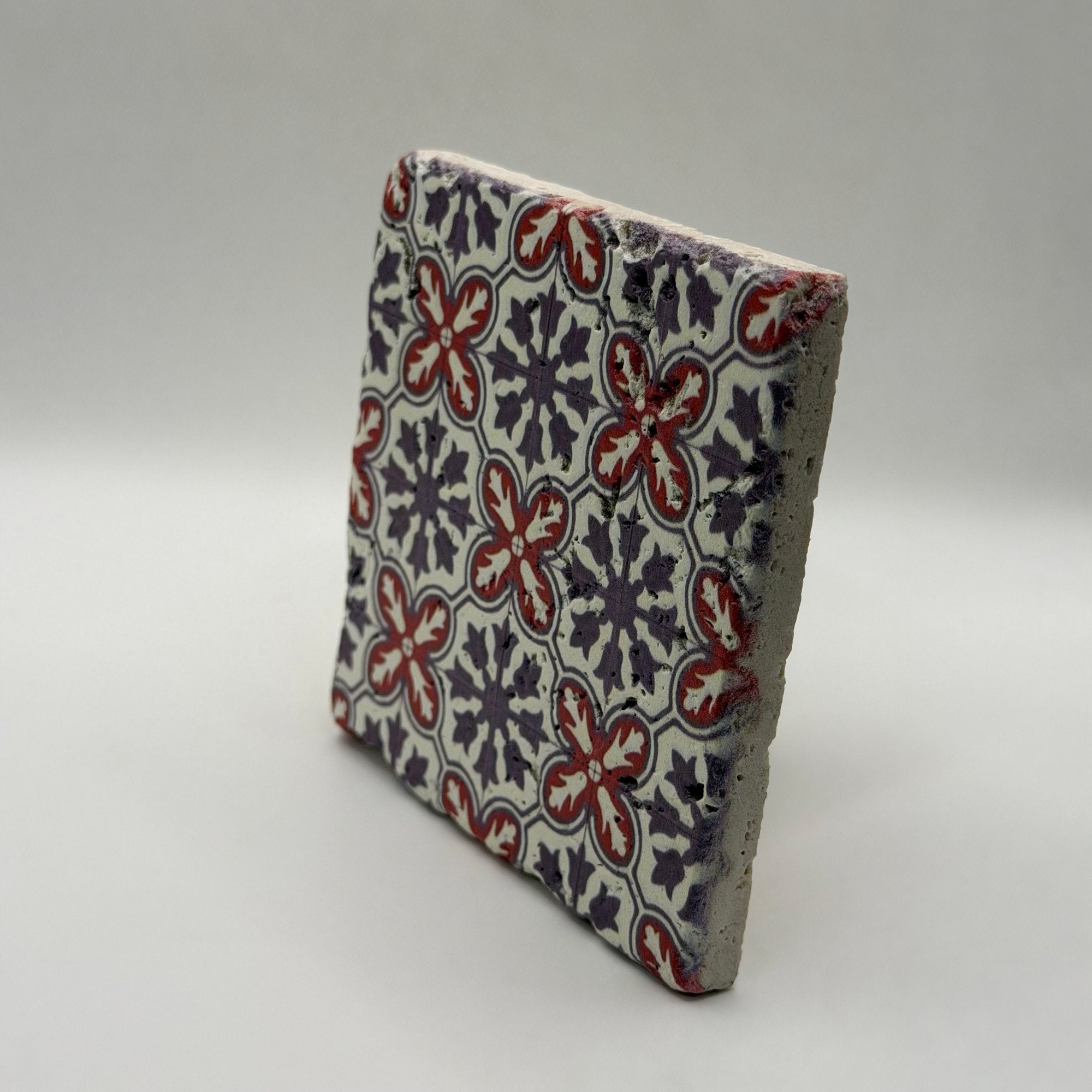 Ethnics pattern number 39 printed on a natural travertine stone coaster