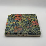 Ethnics pattern number 41 printed on a natural travertine stone coaster