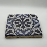 Ethnics pattern number 42 printed on a natural travertine stone coaster