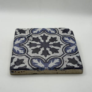 Ethnics pattern number 42 printed on a natural travertine stone coaster
