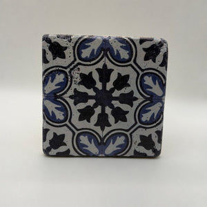 Ethnics pattern number 42 printed on a natural travertine stone coaster