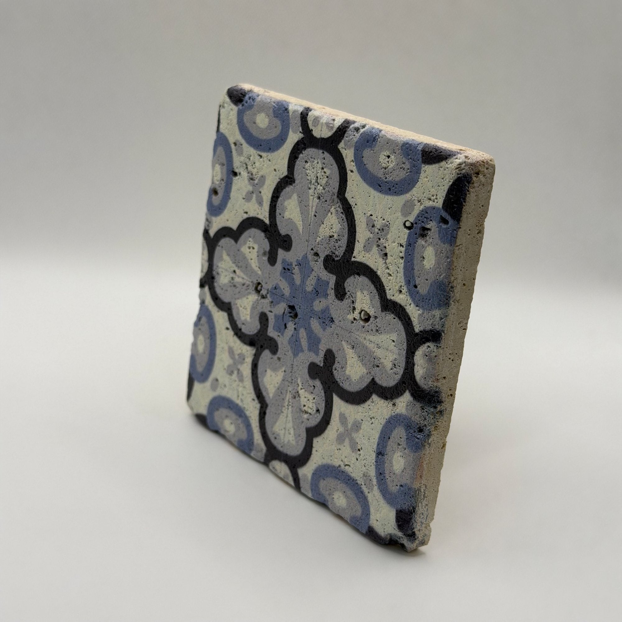Ethnics pattern number 43 printed on a natural travertine stone coaster