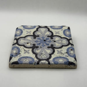 Ethnics pattern number 43 printed on a natural travertine stone coaster