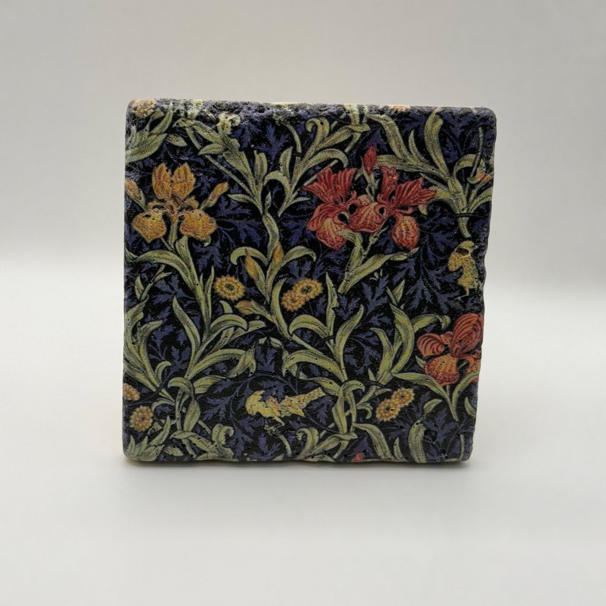 Ethnics pattern number 44 printed on a natural travertine stone coaster