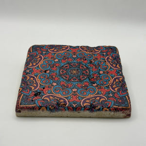 Ethnics pattern number 45 printed on a natural travertine stone coaster