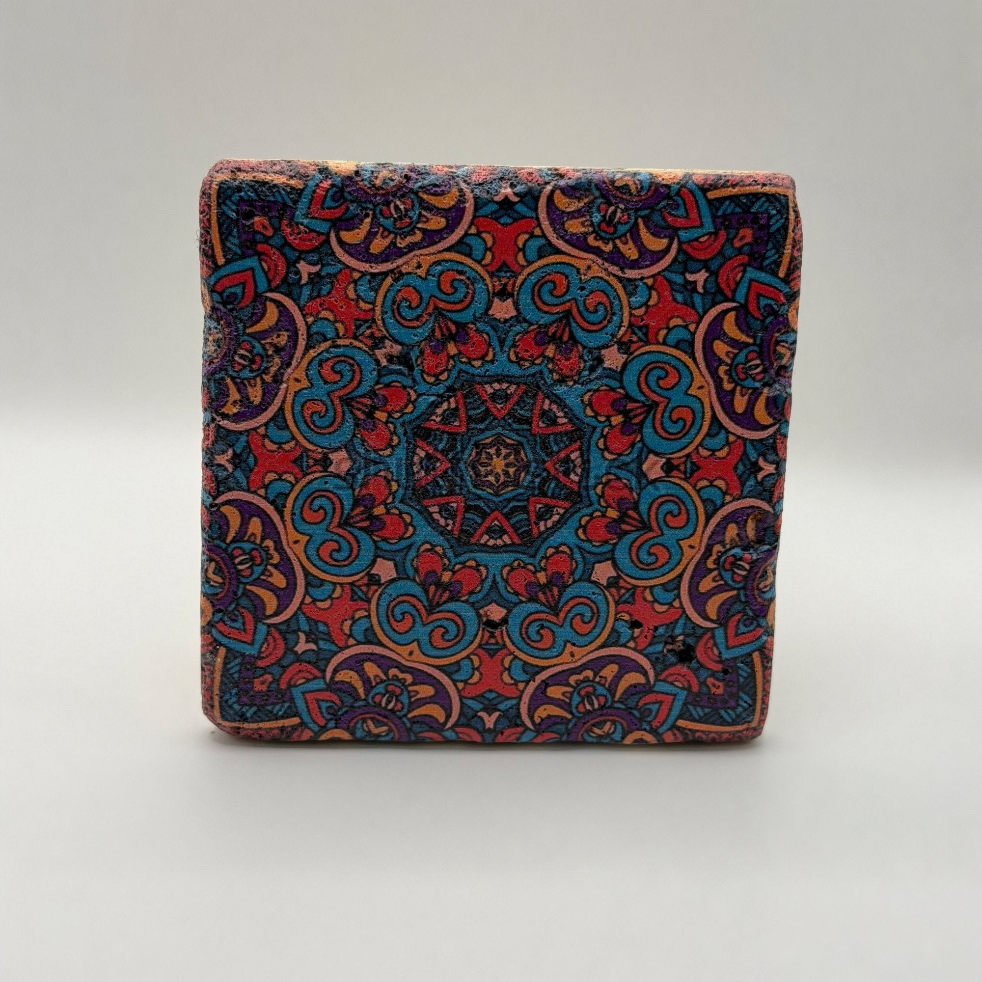 Ethnics pattern number 45 printed on a natural travertine stone coaster