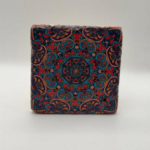 Ethnics pattern number 45 printed on a natural travertine stone coaster