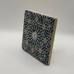 Ethnics pattern number 46 printed on a natural travertine stone coaster