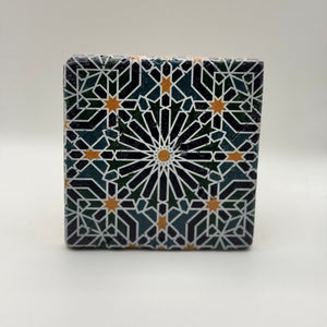 Ethnics pattern number 46 printed on a natural travertine stone coaster