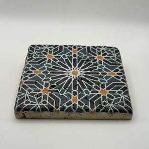 Ethnics pattern number 46 printed on a natural travertine stone coaster