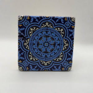 Ethnics pattern number 47 printed on a natural travertine stone coaster