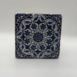 Ethnics pattern number 48 printed on a natural travertine stone coaster