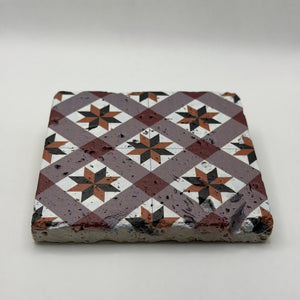 Ethnics pattern number 49 printed on a natural travertine stone coaster