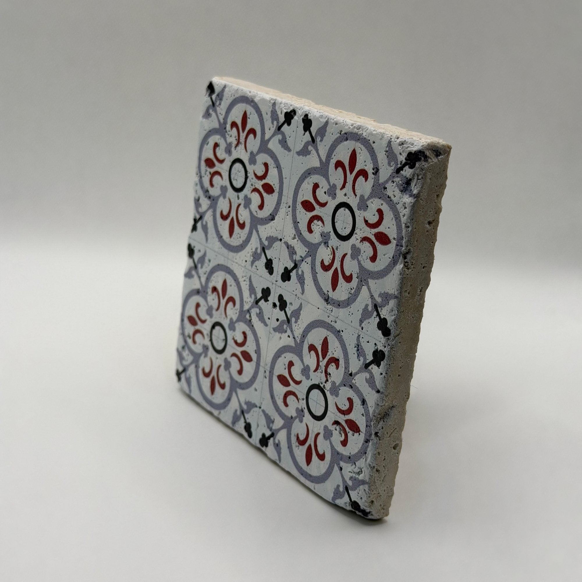 Ethnics pattern number 50 printed on a natural travertine stone coaster