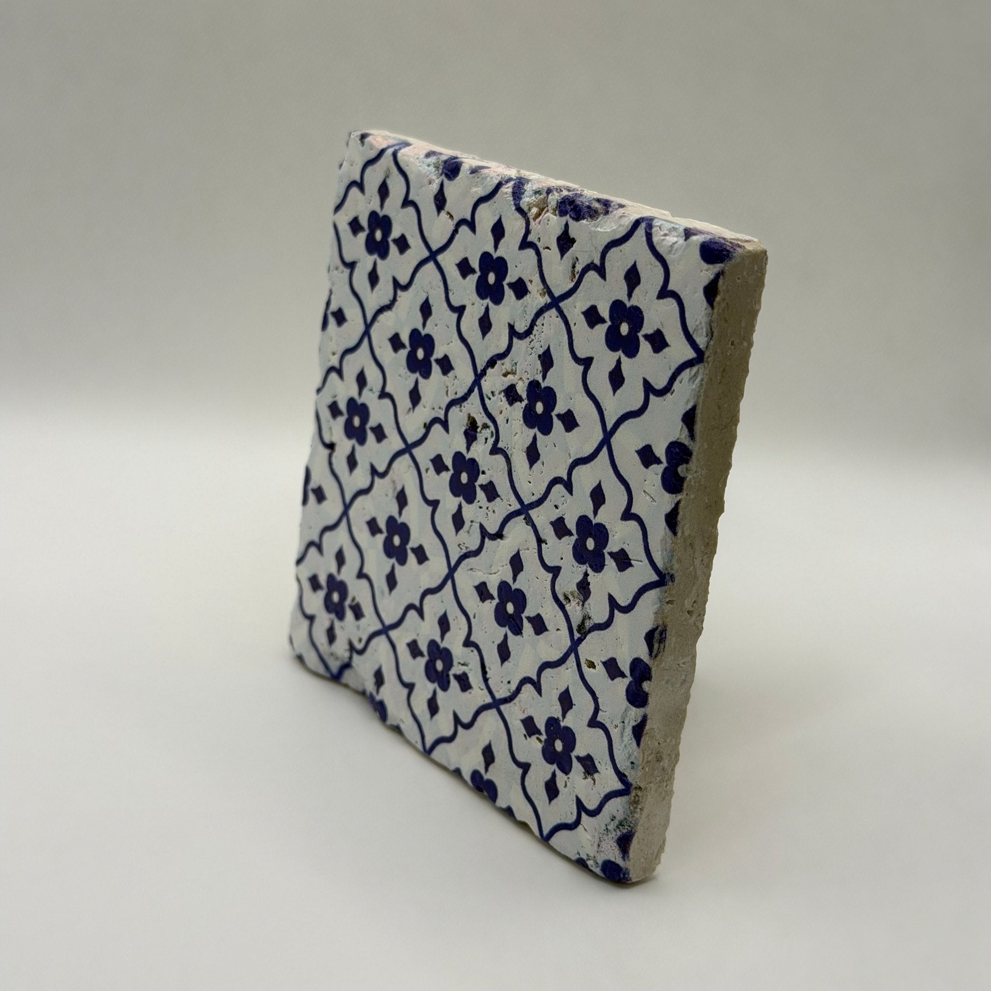Ethnics pattern number 51 printed on a natural travertine stone coaster