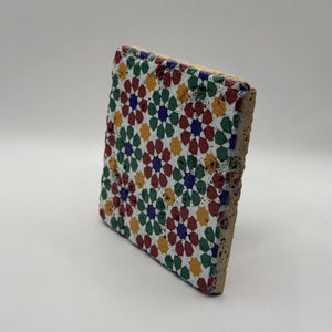 Ethnics pattern number 52 printed on a natural travertine stone coaster