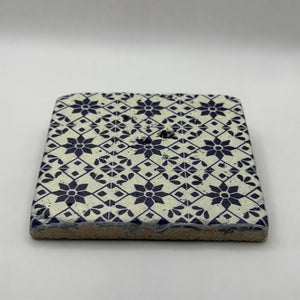Ethnics pattern number 53 printed on a natural travertine stone coaster