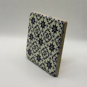 Ethnics pattern number 53 printed on a natural travertine stone coaster