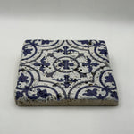 Ethnics pattern number 54 printed on a natural travertine stone coaster