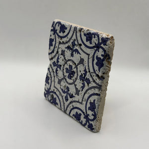 Ethnics pattern number 54 printed on a natural travertine stone coaster