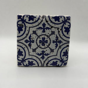 Ethnics pattern number 54 printed on a natural travertine stone coaster