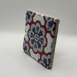 Ethnics pattern number 55 printed on a natural travertine stone coaster