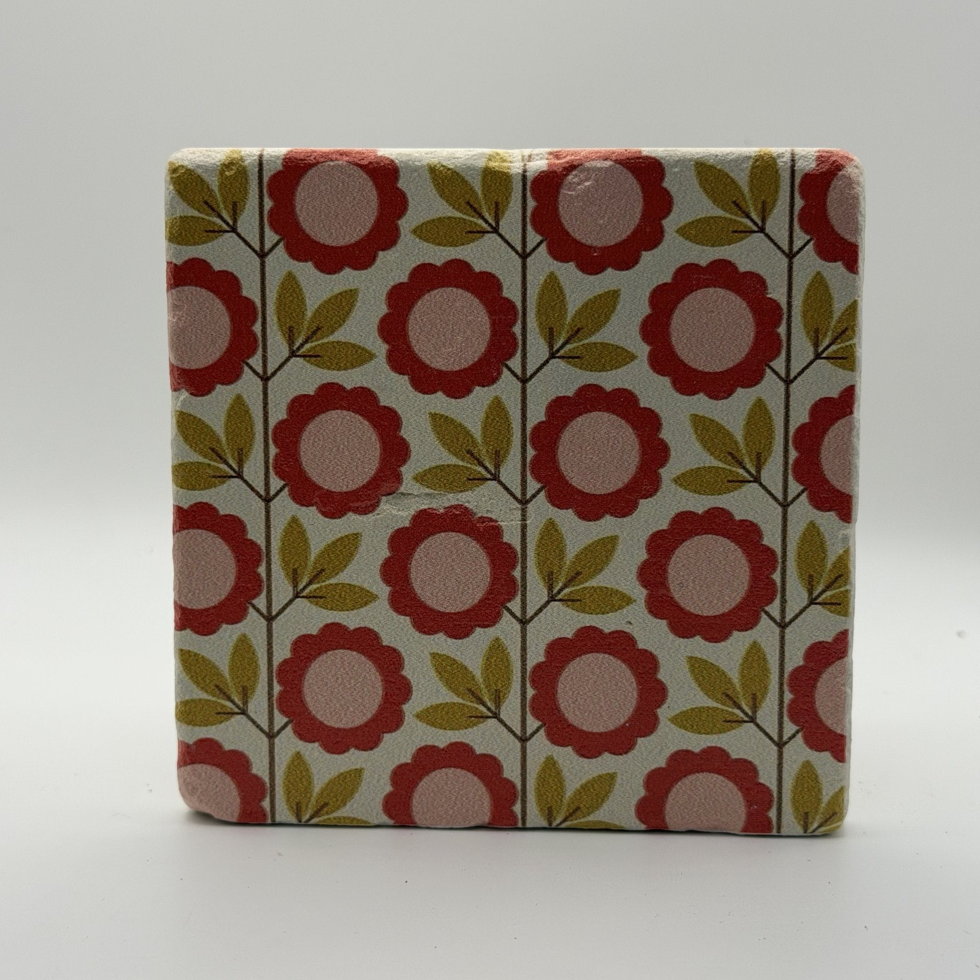 Ethnics pattern number 56 printed on a natural travertine stone coaster