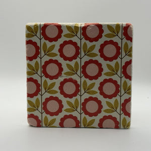 Ethnics pattern number 56 printed on a natural travertine stone coaster
