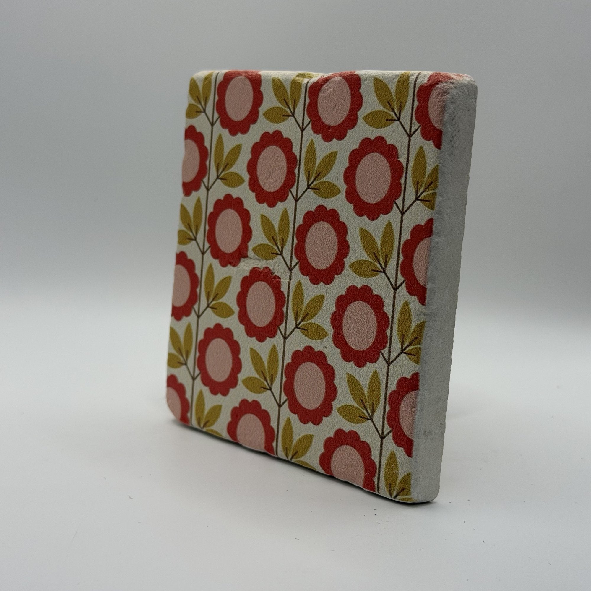 Ethnics pattern number 56 printed on a natural travertine stone coaster