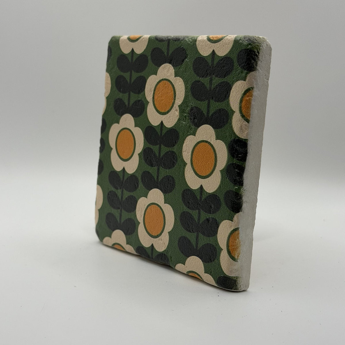 Ethnics pattern number 57 printed on a natural travertine stone coaster