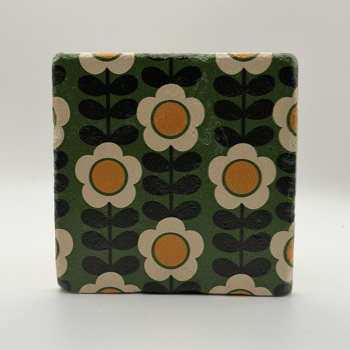 Ethnics pattern number 57 printed on a natural travertine stone coaster