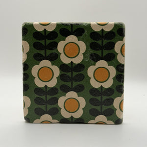 Ethnics pattern number 57 printed on a natural travertine stone coaster