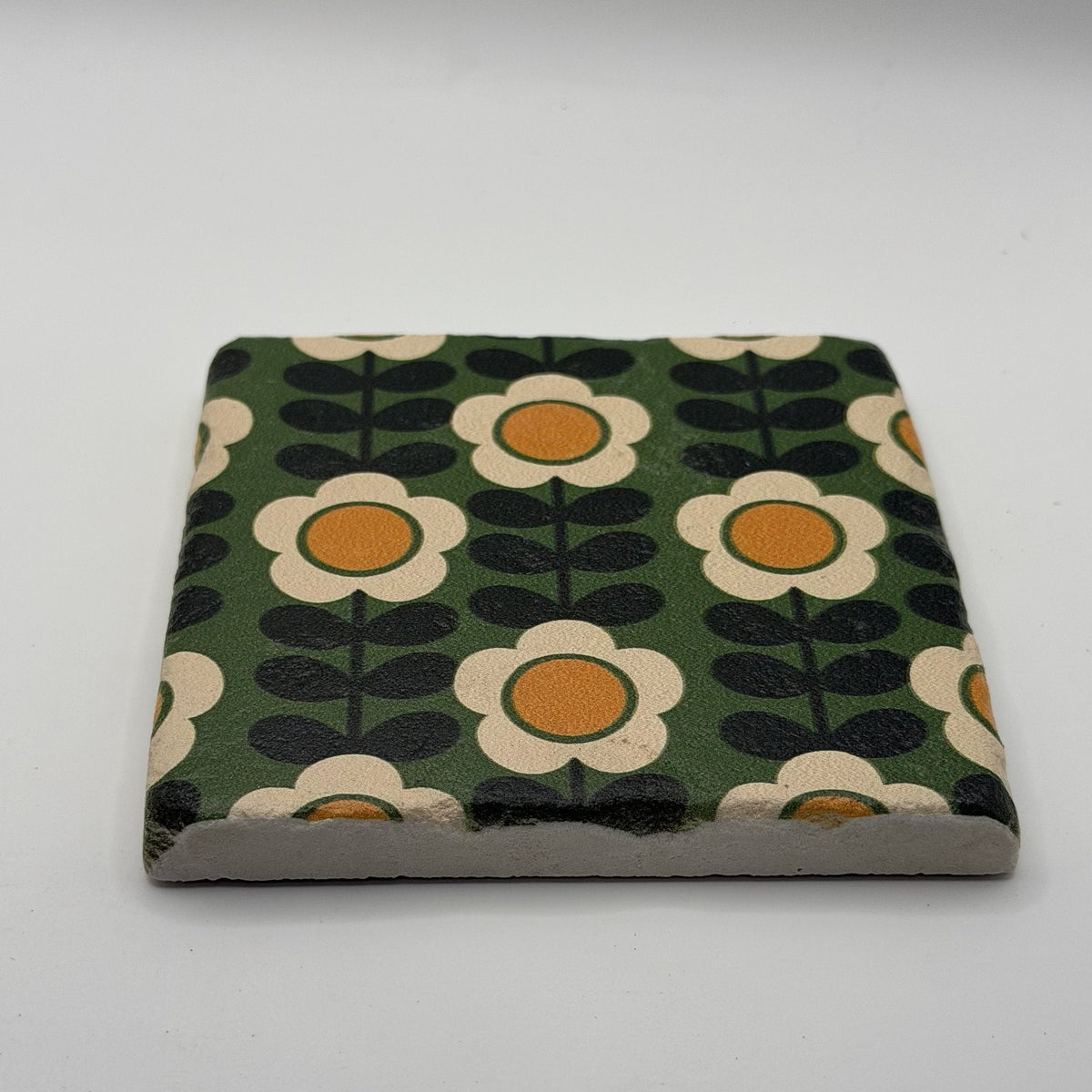 Ethnics pattern number 57 printed on a natural travertine stone coaster