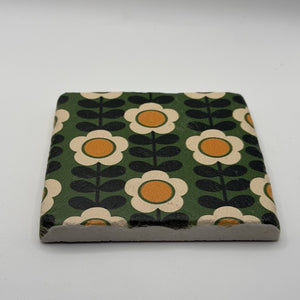 Ethnics pattern number 57 printed on a natural travertine stone coaster