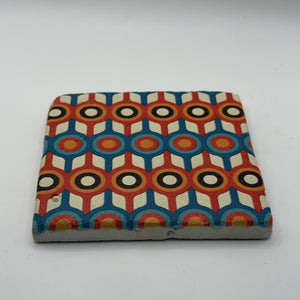 Ethnics pattern number 58 printed on a natural travertine stone coaster