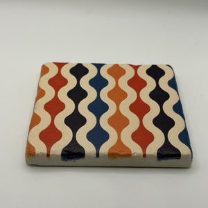 Ethnics pattern number 60 printed on a natural travertine stone coaster