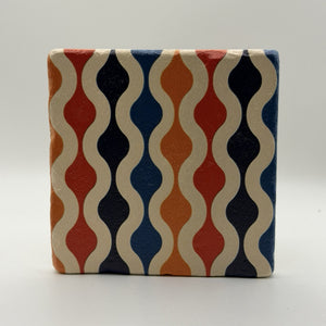 Ethnics pattern number 60 printed on a natural travertine stone coaster
